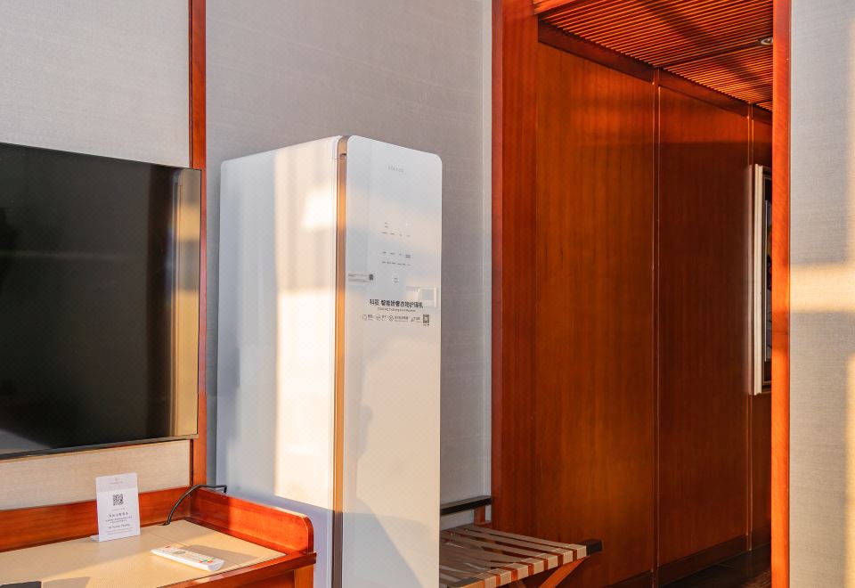 “衣然新尚”豪华大床房