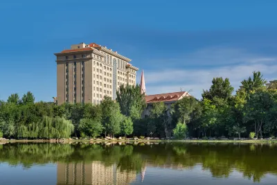 Yili Hotel Отели в г. 
