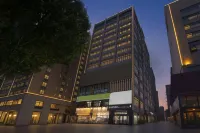 EZZI Hotel (Zhengzhou Longhu Senda College of Economics and Trade Management) Hotel di 