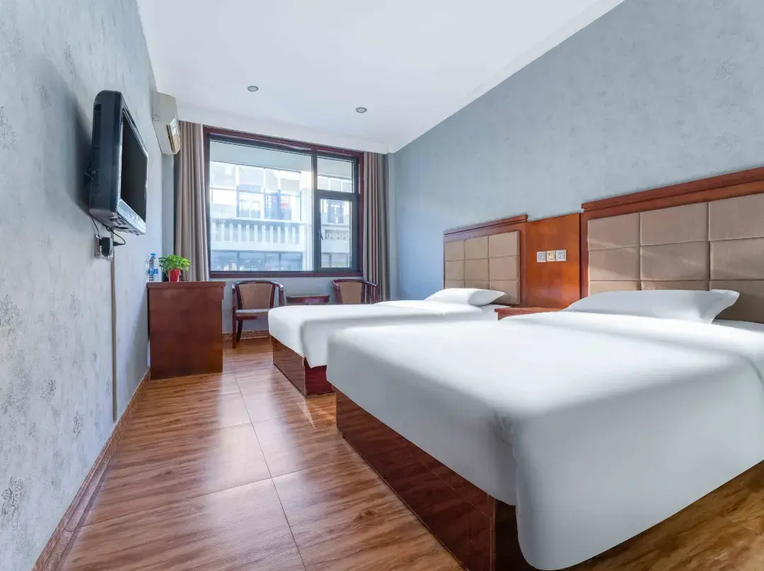 Xianglong Business Hotel - Xinyang