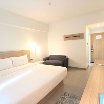 ห้องดีลักซ์เตียงใหญ่ รหัสโปรโมชั่น โรงแรมเอ็มแกรนด์ ร้อยเอ็ด