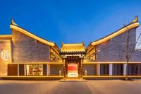 โรงแรมรีสอร์ทน้ำพุร้อนฟูเทียน หัวหยู่ (เมืองโบราณซินโจว) โรงแรมใน