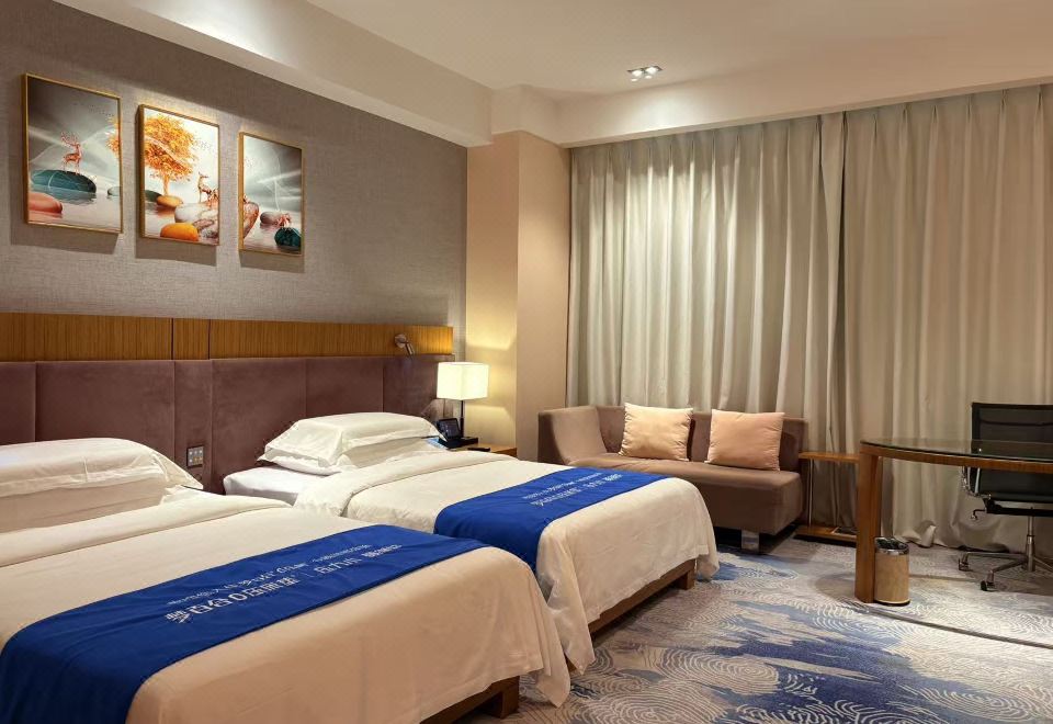 Guanfang Hotel QujingDreamlily Sleeps Peacefully In A Twin Room