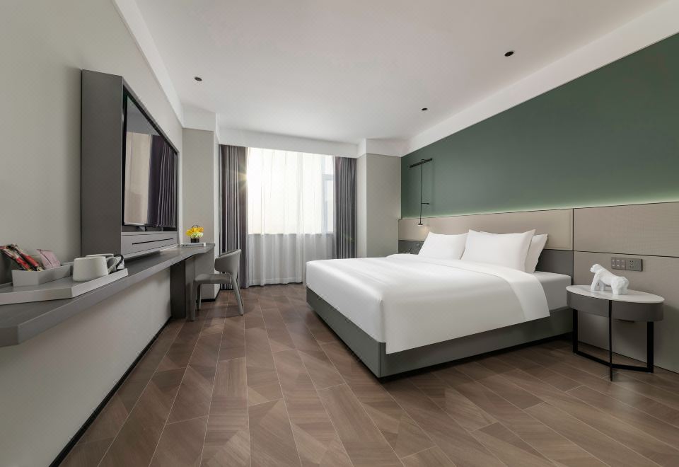 Taiyuan Yiran Hotel (Dongfeng Road East Railway Station) Cozy Queen Room