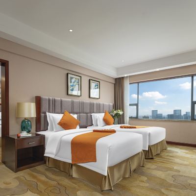 其樂融融家庭套房（三張床+小冰箱+休閑椅+品質床品） 贛州山水大廈（南門口步步高店）優惠