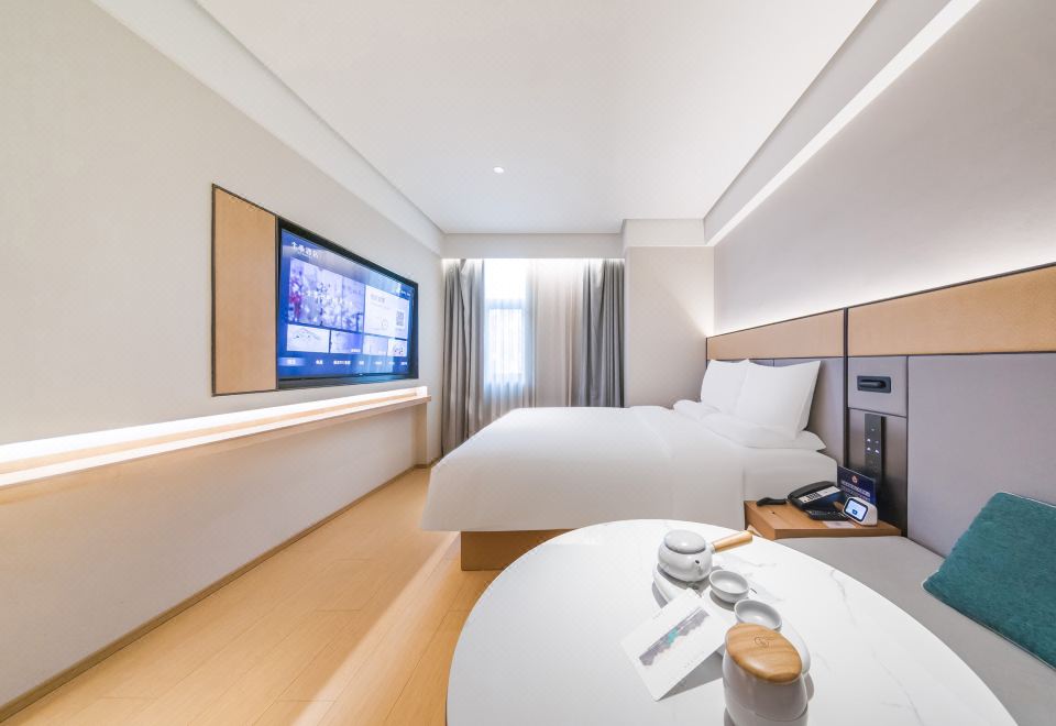 大床房（65寸智能可投屏电视+小冰箱）