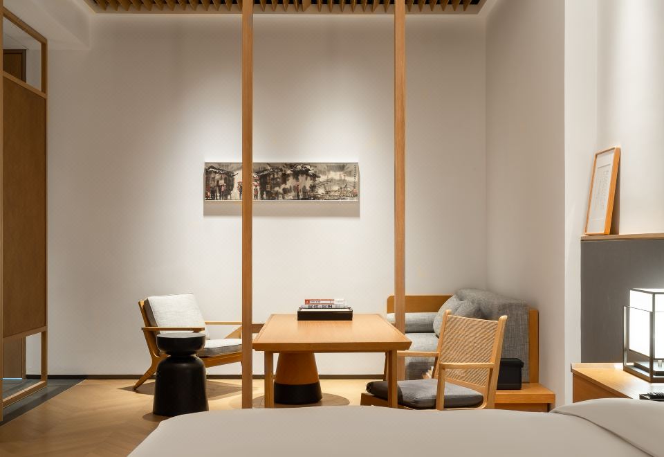 Pokkei Shaoxing HotelPuxiu · Book Collection King Bed Room