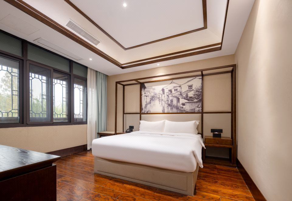 拾光·家庭河景两居套房+河景+中式建筑风格+休闲桌椅