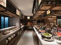 Junyang Hotel (Aksu Railway Station Old Street Night Market) Hotele w: Aksu