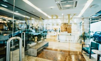 "a glass door with a gold logo that says "" am "" and the word "" park "" on it" at Mark Hotel Belgrade