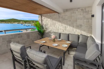 Seafront villa Kupinica with private indoor Pool  호텔