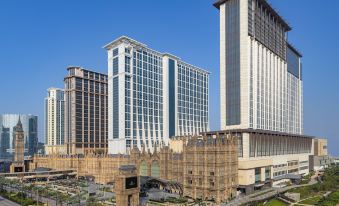The new hotel is situated in a bustling city filled with towering office buildings at Sheraton Grand Macao