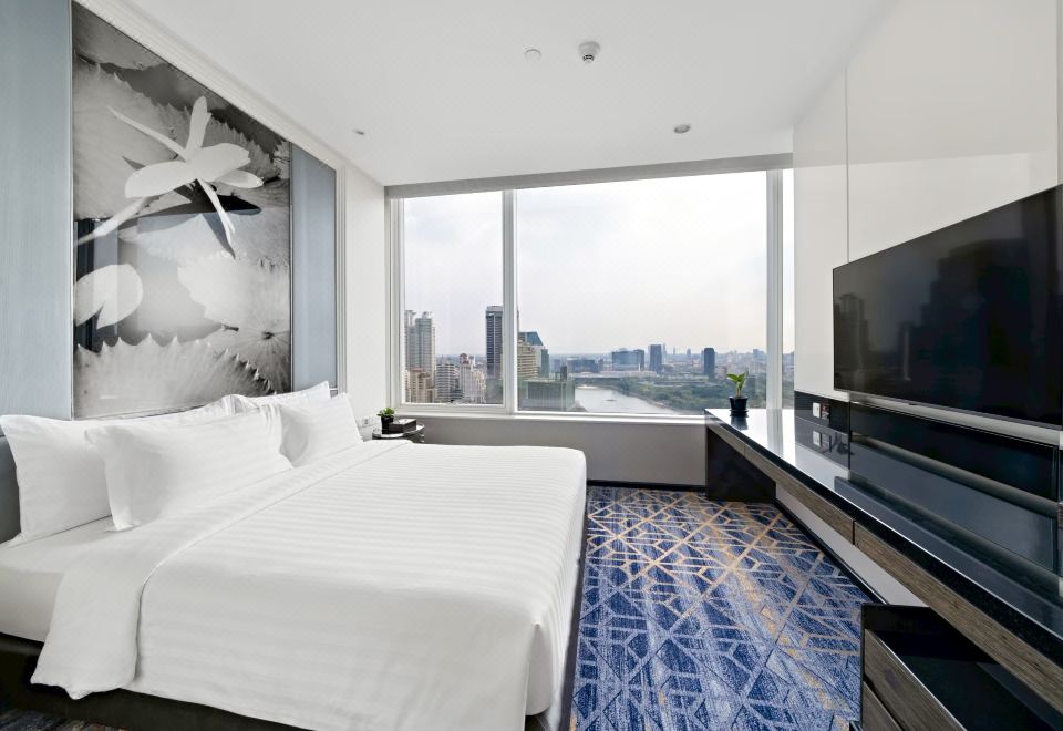 Grande Centre Point Hotel Terminal 21Grand Suite Quad (1 King Bed + 2 Rollaway Bed)