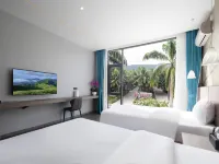 Baoting Sandao Yujing Rainforest Business Hotel فنادق في باوتينغ