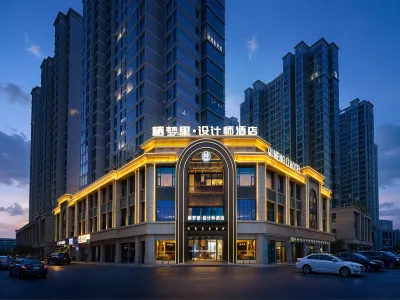 Qimengli · Designer Hotel (Yiwu International Trade City Branch) Hotel a 