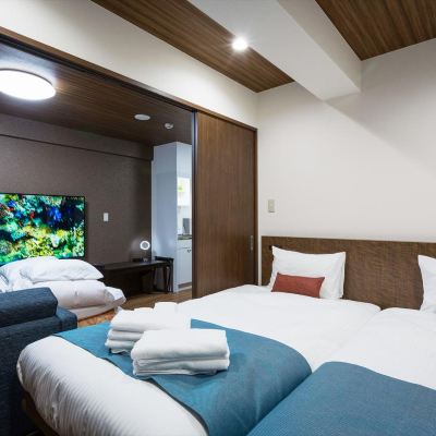 ワイドツイン かりゆしコンドミニアムリゾート那覇　龍神ホテル浮島 クーポン