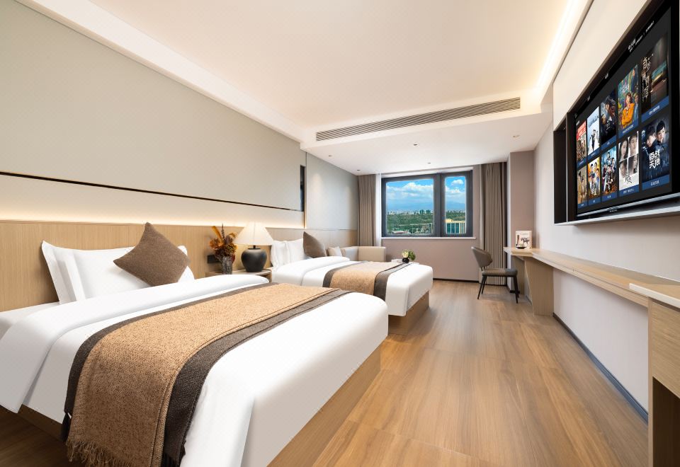 高级双床房（亲肤床品+零压床垫+65寸投屏电视+沙发）