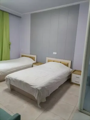 暖居民宿（南二環理工店） Hotels in China University of Geosciences Great Wall College