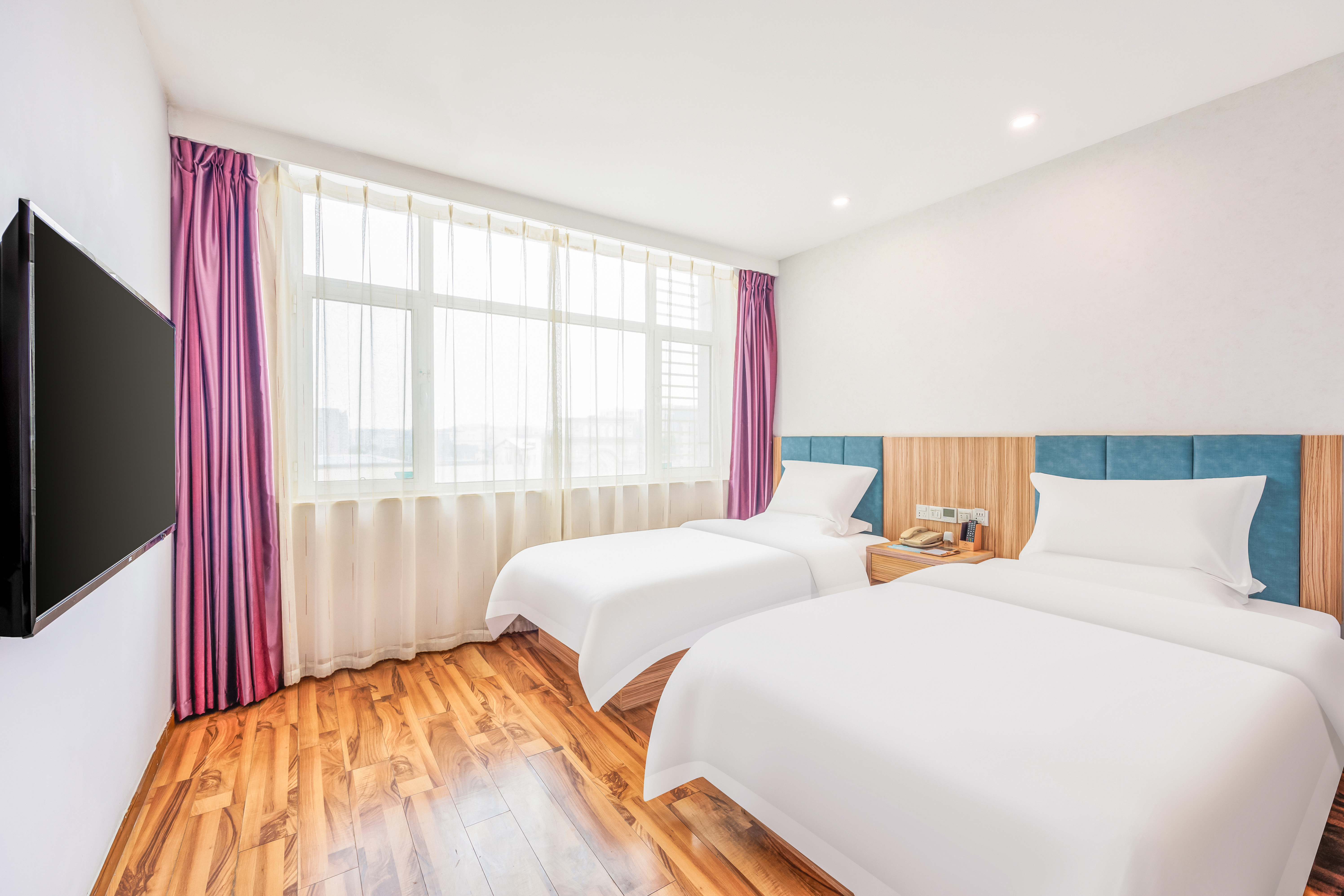 商务阳光双床房（独立空调+席梦思床垫+羽绒枕+羽绒被）