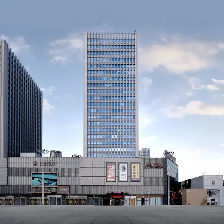Wanda Spring Business Hotel (Daqing Sa'ertu Wanda Plaza) Отели в г. Дацин