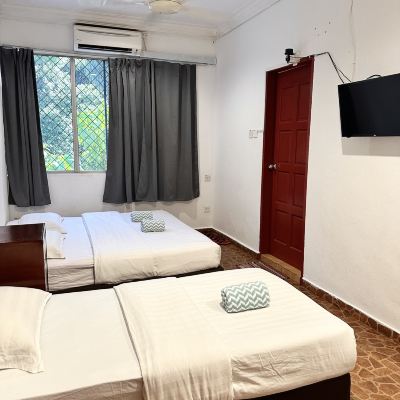 Bilik Deluxe Keluarga Kupon Warisan Family Inn
