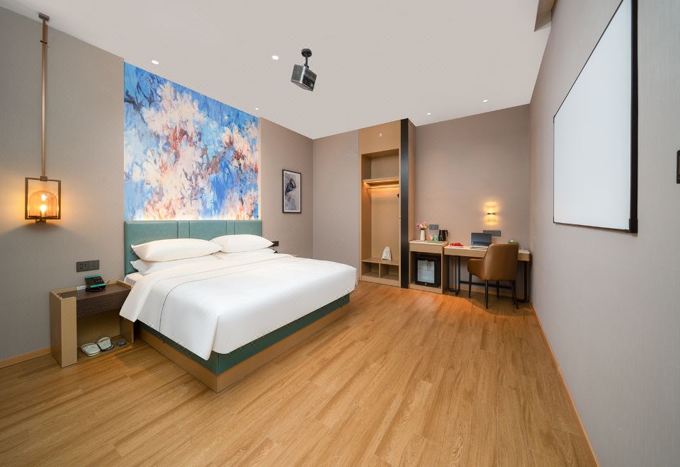 Magnotel Hotel (Jinzhong Lingshi Xinjian Street)Audio-Visual Delight Quiet Elegance Double Bed Room