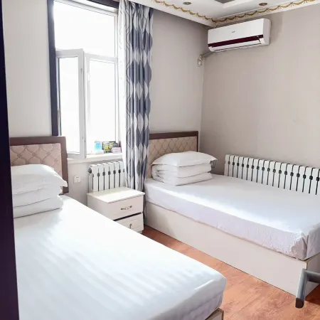 Huma Xinli Hotel Отели в г. Хума