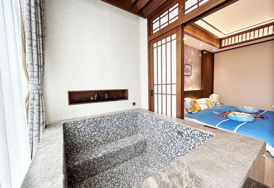 Baihualin Hot Spring Valley HotelPleasant Goat And Big Big Wolf Theme Family Double Bed Room