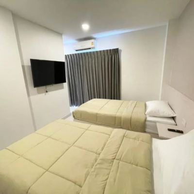 ห้องดีลักซ์ เตียงแฝด พร้อมระเบียง รหัสโปรโมชั่น มังกร โฮสเทล