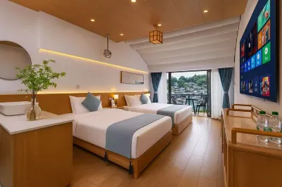 Tianqingshe Riverview Homestay (Phoenix Ancient City Lijiang Branch) Hotels in 