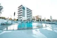 Nlh Mati Seafront - Neighborhood Lifestyle Hotels Отели в г. 