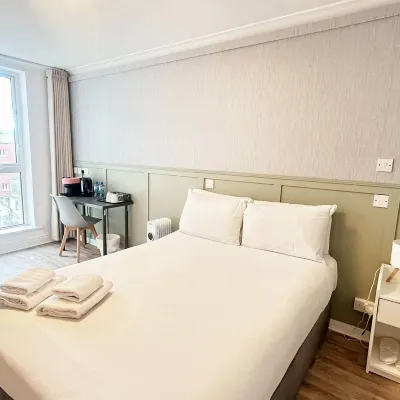 Abbey Hotel Hotels near Button Factory
