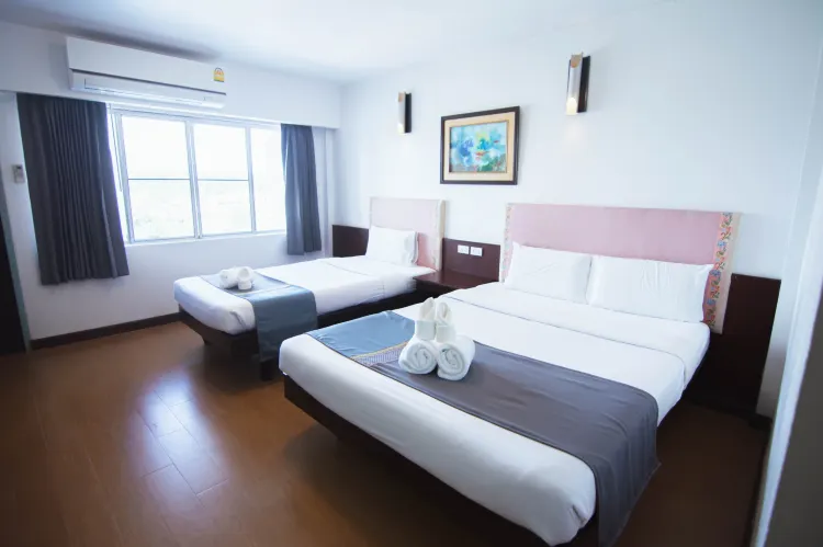 Family Triple Room with City View (Balcony, Cooling Only Air Conditioner)