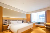 Ximan Hotel (Shanzhou District Government Wucaicheng Shopping Center)