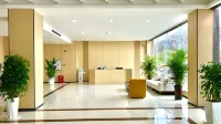 Wuning Baolixiong Hotel (Hubin North Road)