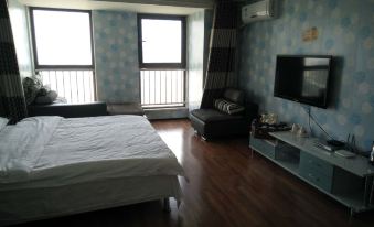 Qingju Yashe Apartment Hotel