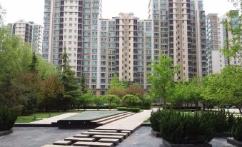 aisheng Mingyuan Serviced Apartment Hotel