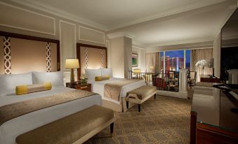 The bedroom is furnished with a bed, desk, and large windows in the middle at The Venetian Macao