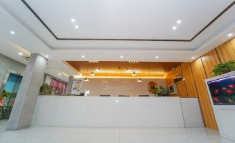The reception desk is situated in a spacious and modern office area with an open design at Super 8 Hotel (Shanghai Pudong Airport Chenyang Road)