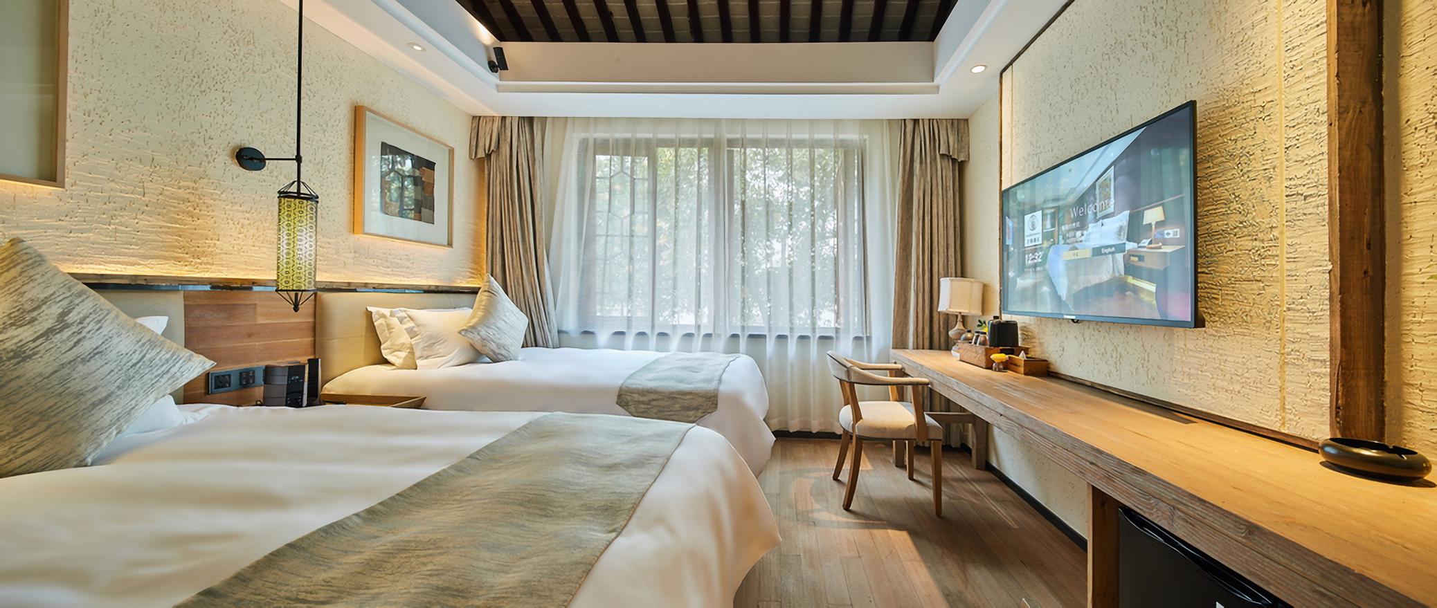 Yiman Hotel (Suzhou Guanqianjie Pingjiang Road Scenic Area)临河标准房（智能声控+小冰箱+乐家衞浴）