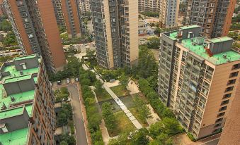 Qingdao Hong Ding Yijia Holiday Apartment