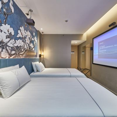 影音悅享靜雅雙床房 白玉蘭飯店（上海閔行吳涇華師大店）優惠