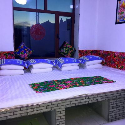 冬日暖陽四人間 霧凇島張家客棧優惠