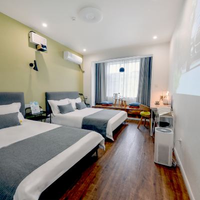 花園投影家庭房 笑臉裡·好久不見青年旅舍（成都寬窄巷子店）優惠