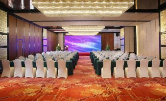 A ballroom is prepared with tables and chairs for an event at the hotel or conference at Best Western Felicity Hotel