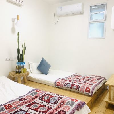 榻榻米投影雙床房 笑臉裡·好久不見青年旅舍（成都寬窄巷子店）優惠