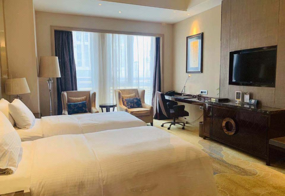 Wanda Realm FushunHollywood Twin Room (large Space + Large Bathtub + King Bed)