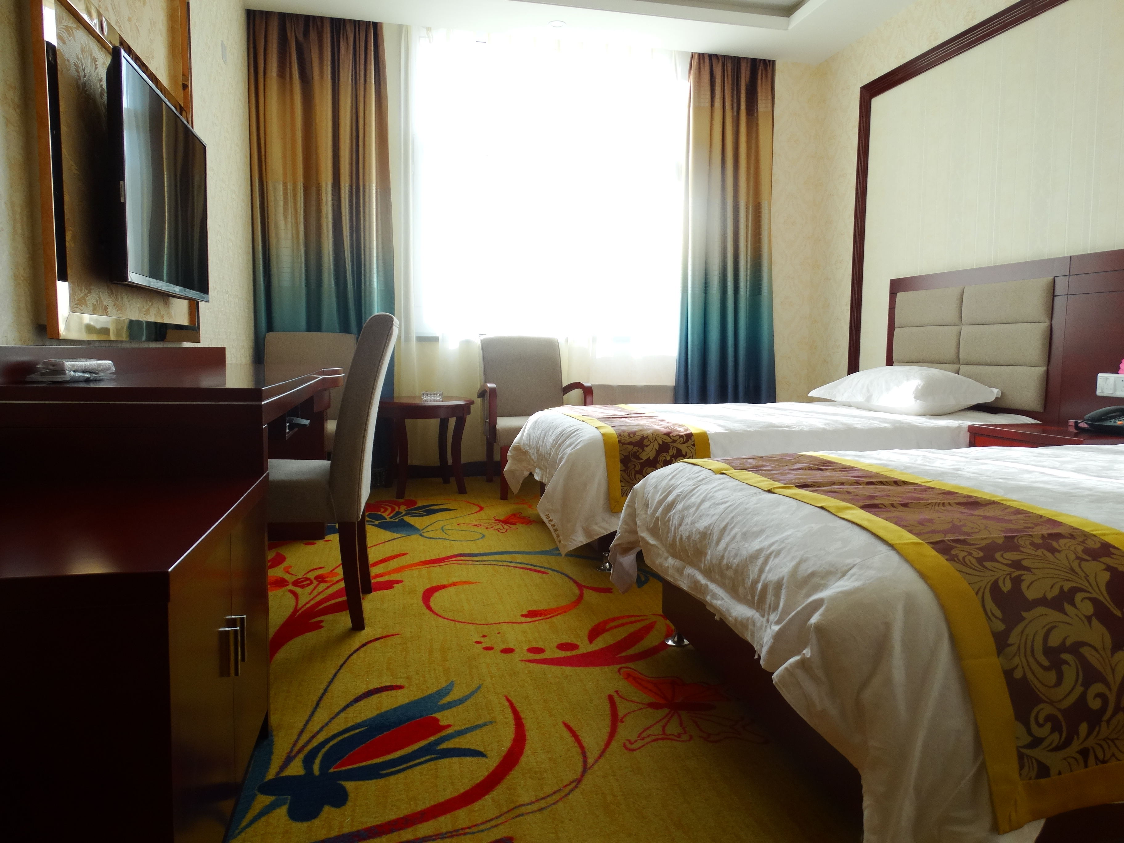 Mulei Sunshine Flower Garden Hotel娱乐房