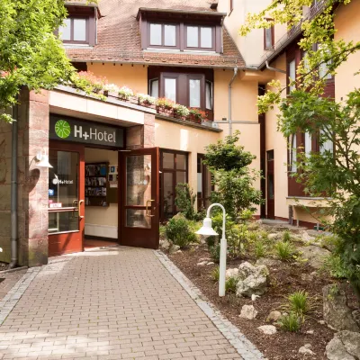 H+ Hotel Nürnberg by Sunday Hotels Hôtels à proximité de : Stade Max-Morlock-Stadion
