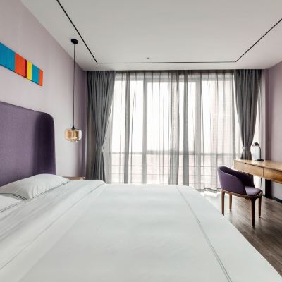 精緻城景大床套間（冰箱+一室一廳+護脊床墊） 樂福全套間飯店（蘇州金雞湖博覽中心店）優惠